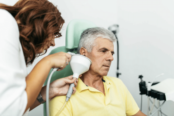 A hearing instrument specialist providing ear cleaning services at Hearing Health Connection in Pennsylvania.